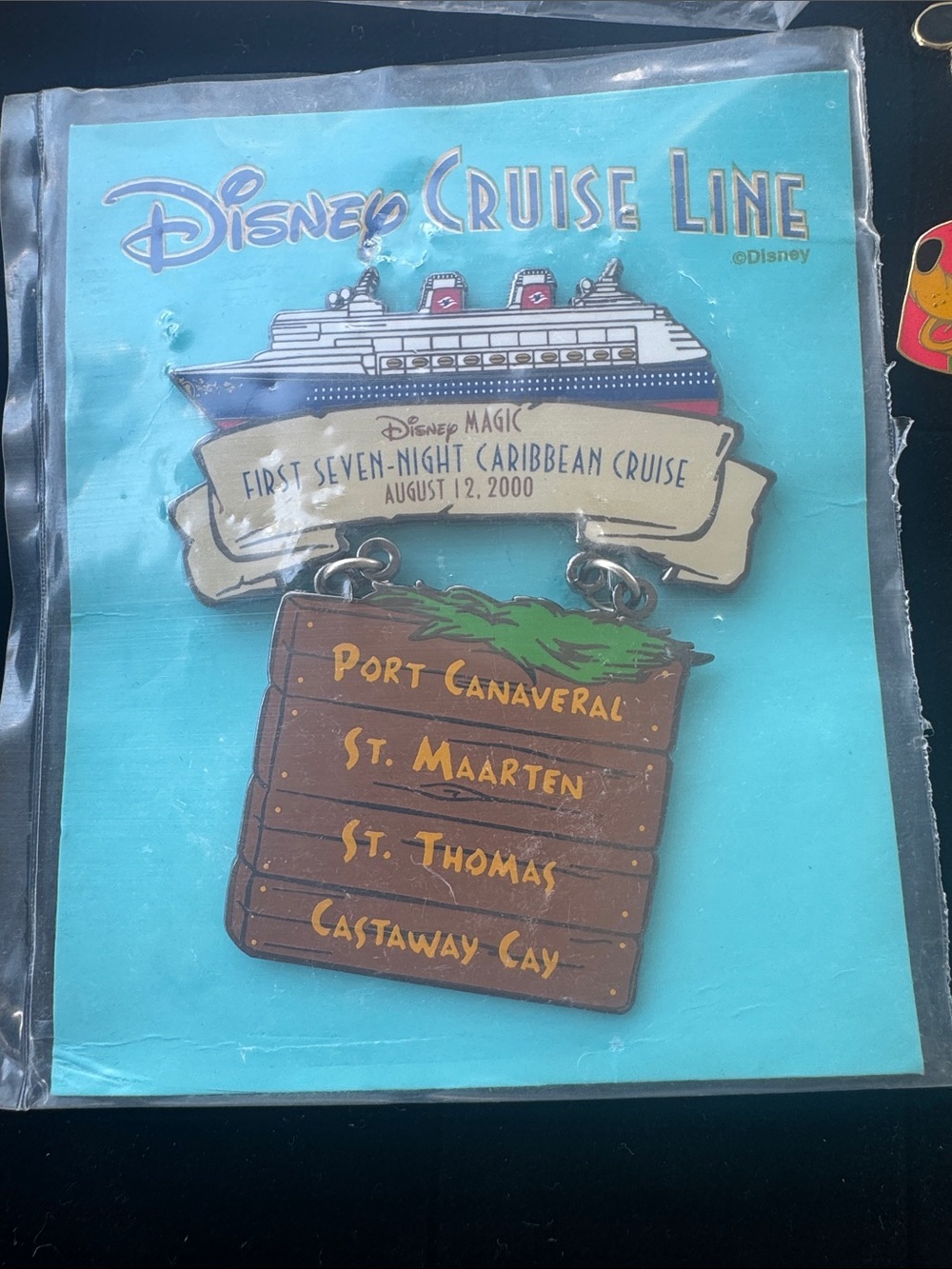 Disney Cruise Line Pin with Turquoise Background and Brown Wood Port Tag